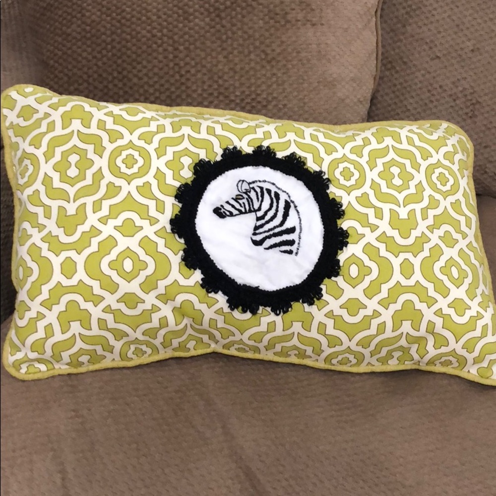 Green white and black pillow